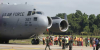 13 children, 25 women, total 104; Arrived in India by American military flight for 40 hours