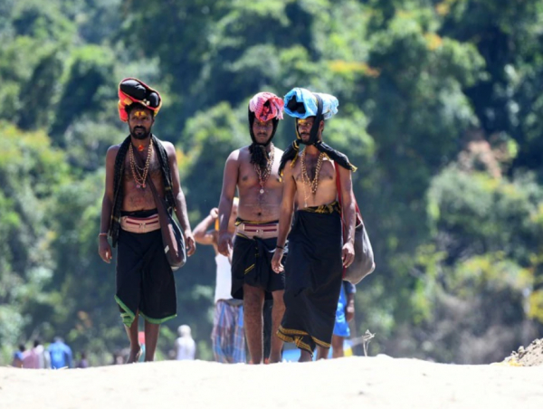 Distribution of Ayurvedic drinking water to the pilgrims for immunity